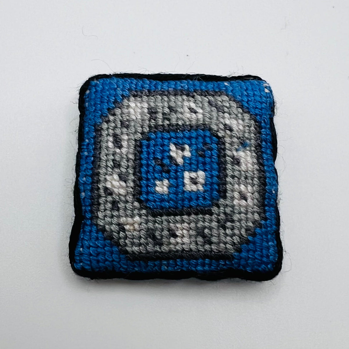 Cross Stitched Cushion - 1/12 Scale Dollhouse Miniature